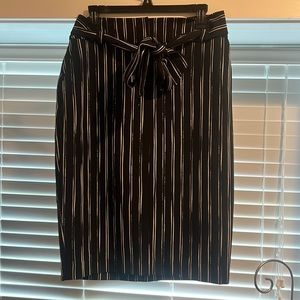 High waisted, pencil skirt with tie. Pinstripe